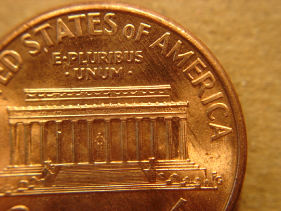 1994-P-LMC:-Die-Scrapes-From-Feeder-Finger-Damage-On-Reverse.
